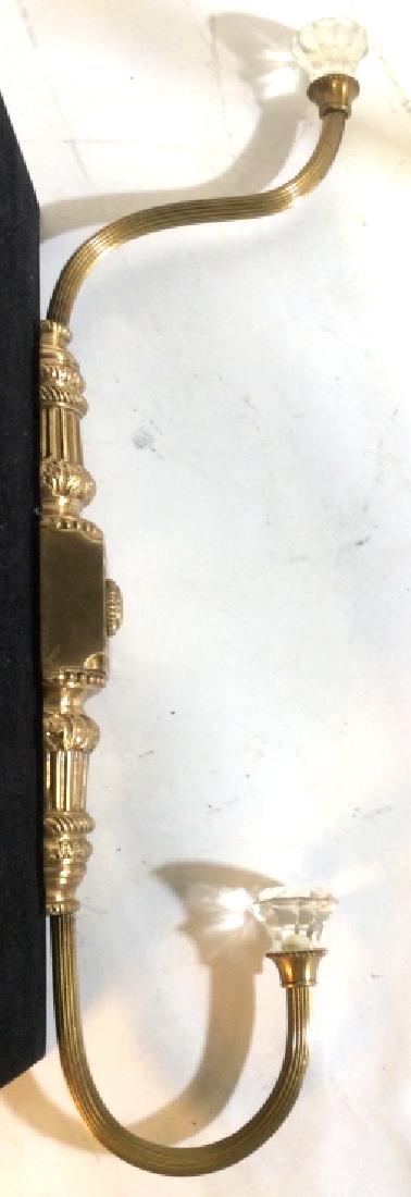 Bombay & Co. Wall Coat Hook: Edwardian Style with Composite material decorative knobs at ends, Attaches to the wall. No Hardware. Felt Backing to protect the wall. Entire Length, approx 18.5 in. Can hang Coats on top and bottom. 