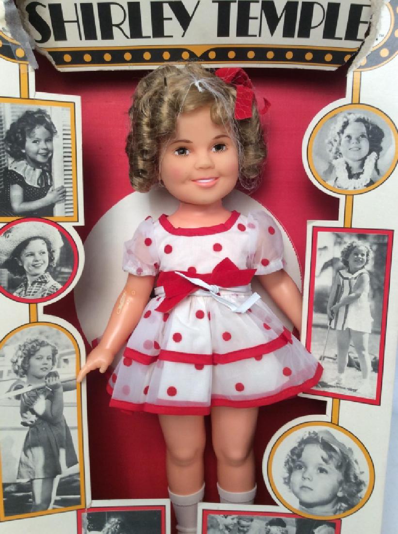 IDEAL Shirley Temple Doll in Box: Collectible Shirley temple doll in original packaging, red and white polka dot dress, in box marked for IDEAL no 1125, arms and legs are possible, clothes are removable, Titled now appearing Shirley t