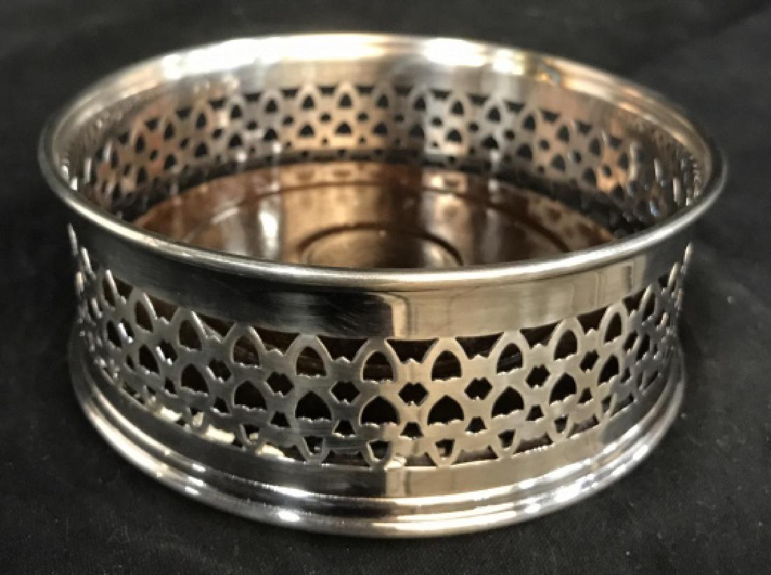 Silver and Mahogany Wine Coaster: Possibly English, pierced Silver toned gallery and Mahogany center, table ware, measures app 2.5 inches diameter 5.5 inches, tableware, wine coaster, barware