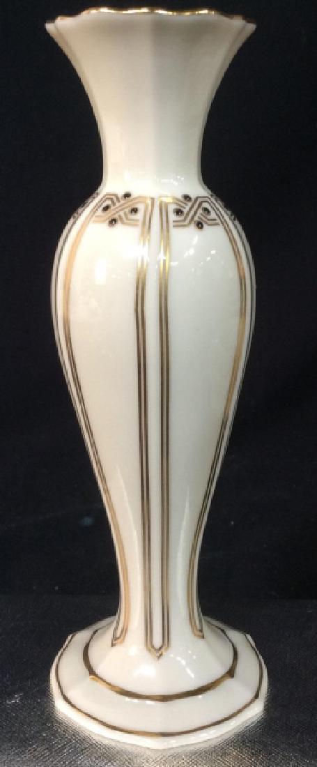 Vintage Lenox Vase: Vanguard Collection. Porcelain. Cream Color with GoldLeaf Trim. Nice for Bedside Stand or Powder Room. No visible marks. Nice Detail. 7 3 / 4 in. tall. Opening approx 1/2 in. Lenox Vase, Table Top Dec