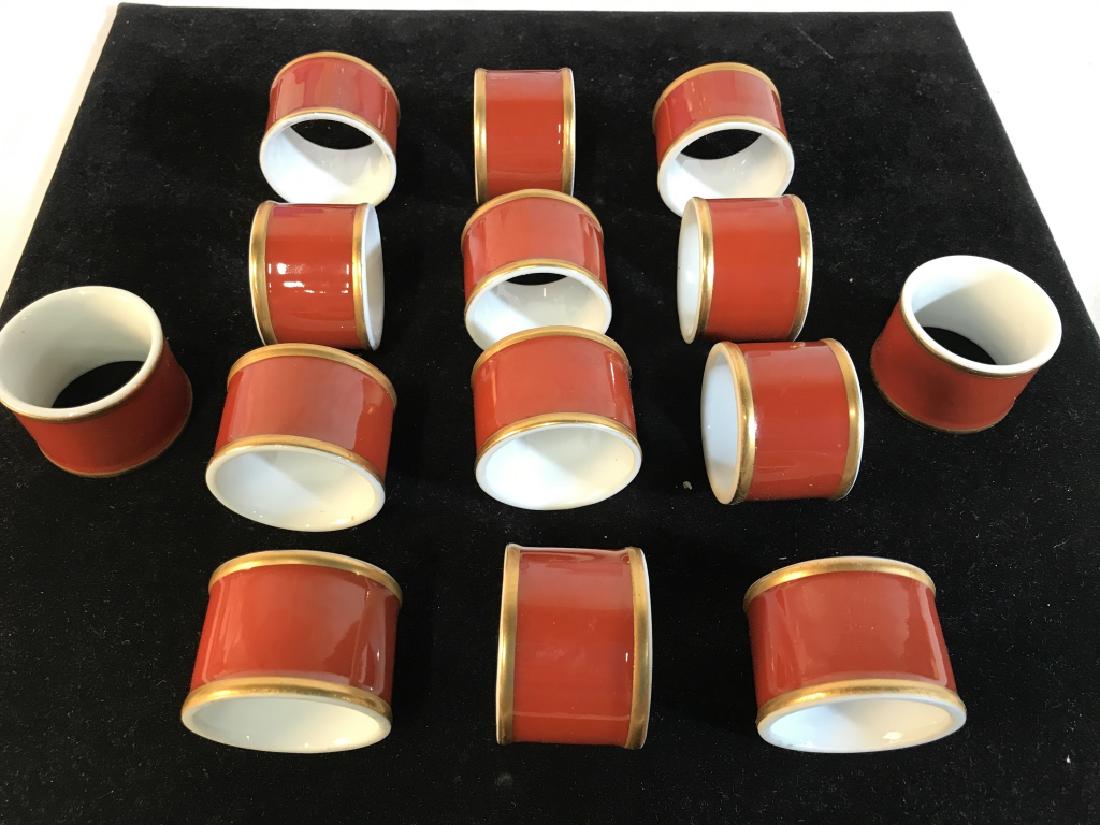 Set 14 Vintage Porcelain Napkin Rings: Orange and Gold Rims, White Interiors. Possibly from the 1970s. Approx 1 1/4 dia. Some wear on the gold rim from use. No Cracks or Marks Otherwise. Groovy Dinner Napkin Rings, Vintage Porcelain Napkin
