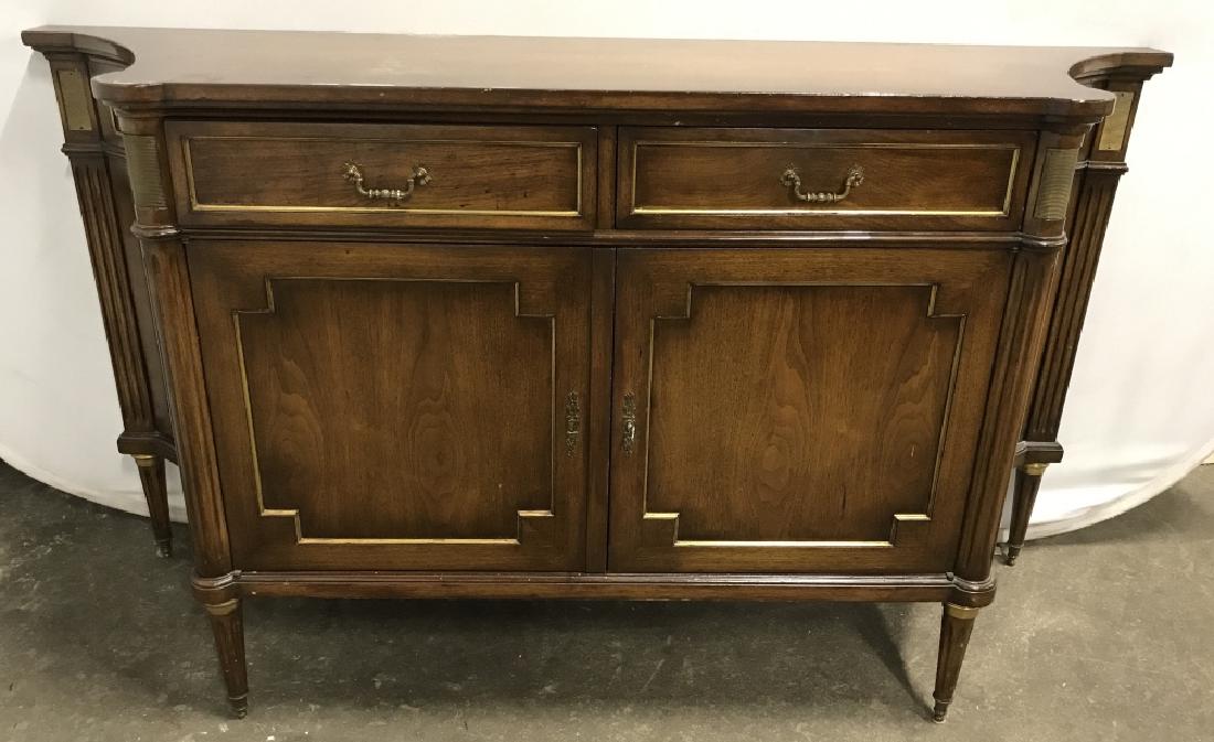 Vintage Sideboard Buffet W Concave Sides: Vintage traditional style sideboard buffet table credenza Cabinet with brass metal details. Sideboard has two compartmentalized top drawers and a two-door bottom cabinet. Concave sides. Measures appro