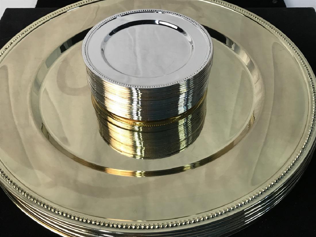 Lot Gold Tnd Metal Chargers & Silver Tnd Coasters: 8 Gold Toned Plate Chargers from Godinger Silver Art Co. Ltd. Labeled on Underside. 11.5 in. dia. Have scratch marks from use. Silver Toned Coasters, 6 new and packaged in box. 18 others. Coaster coul