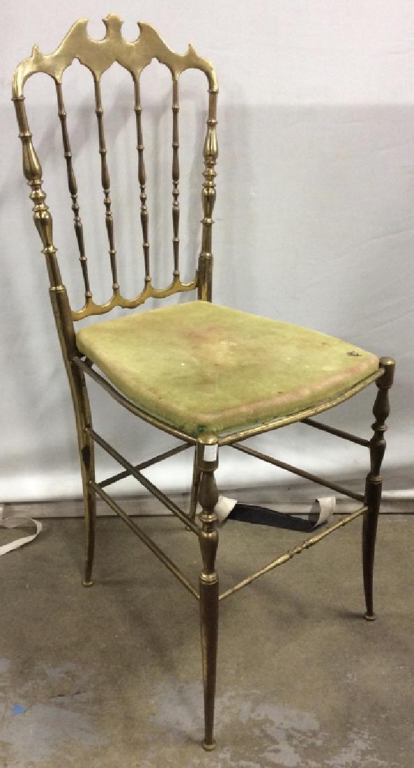Vintage/Antique Gold Toned Brass Chair: Chair is brass. Piece is vintage possibly antique. Side chair, brass chair, vintage chair, metal chair. Measures approx. 35 inches tall 17 inches deep 14 inches wide. Cushion has evident discoloration