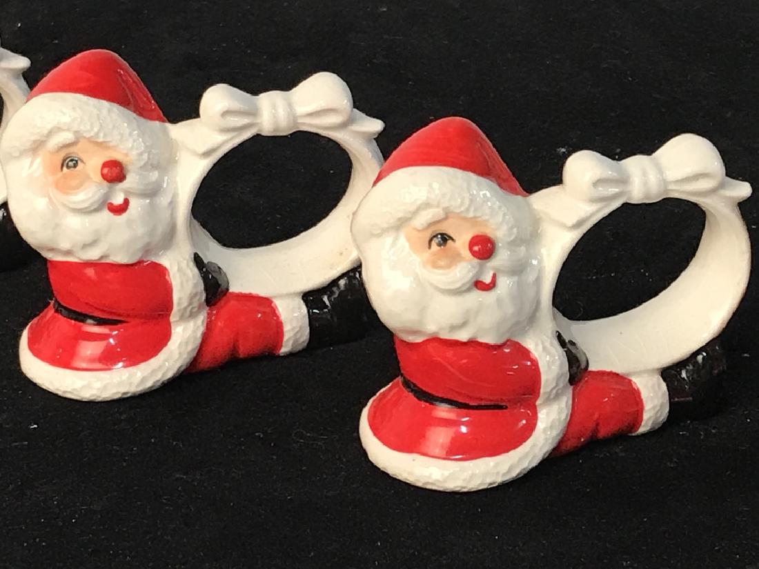 Set 4 Vintage Porcelain Santa Napkin Rings: Use as a decoration and attach balloons or small stockings. These are Hand Painted. With no chipping. Measures approx 3 1/4 in long. Napkin insert, 1 1/4 in dia. Santa Napkin Rings, Vintage F.F. Napki