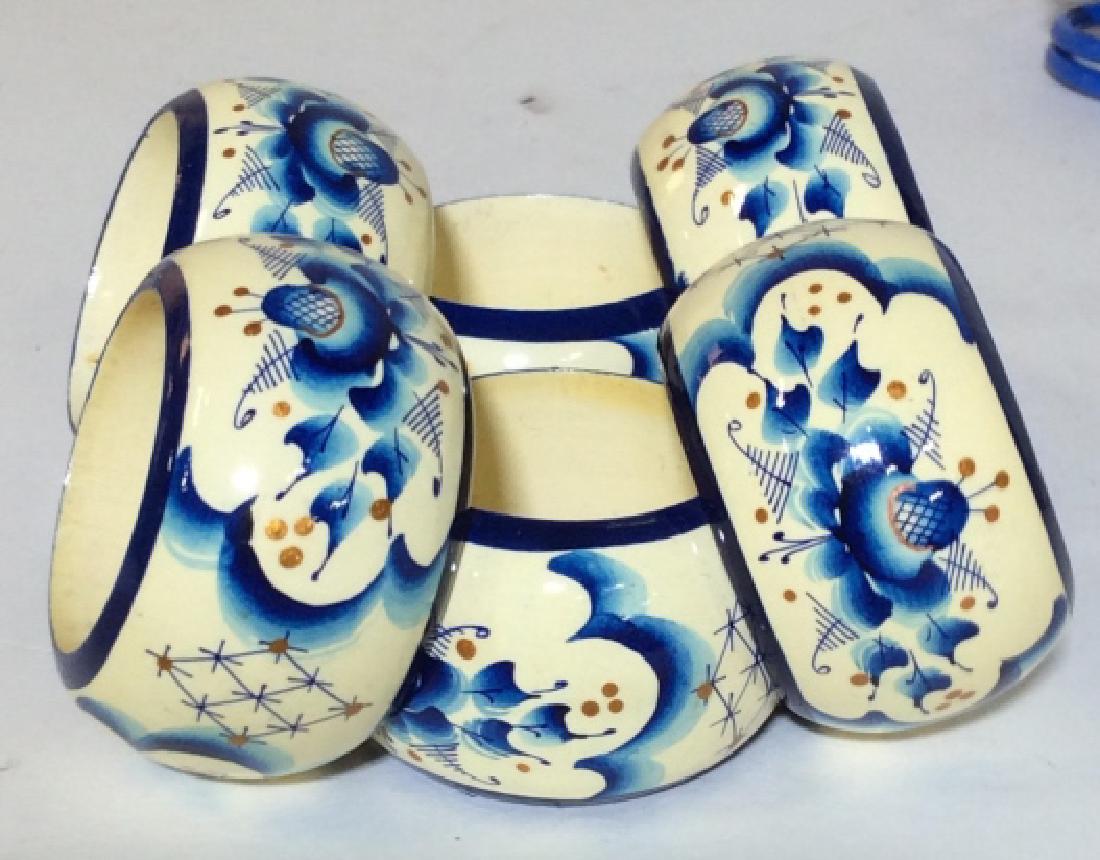 Lot- Assortment Of Vintage Napkin Rings: 4 Blue Metal Spring Rings 6 Painted Dark Blue & Floral Rings 6 Painted Medium Blue Floral Rings with Blue Rim 6 Painted Floral Rings with Medium Blue Dual Rim Trim 7 Light Blue Floral Rings 10 Lacquer
