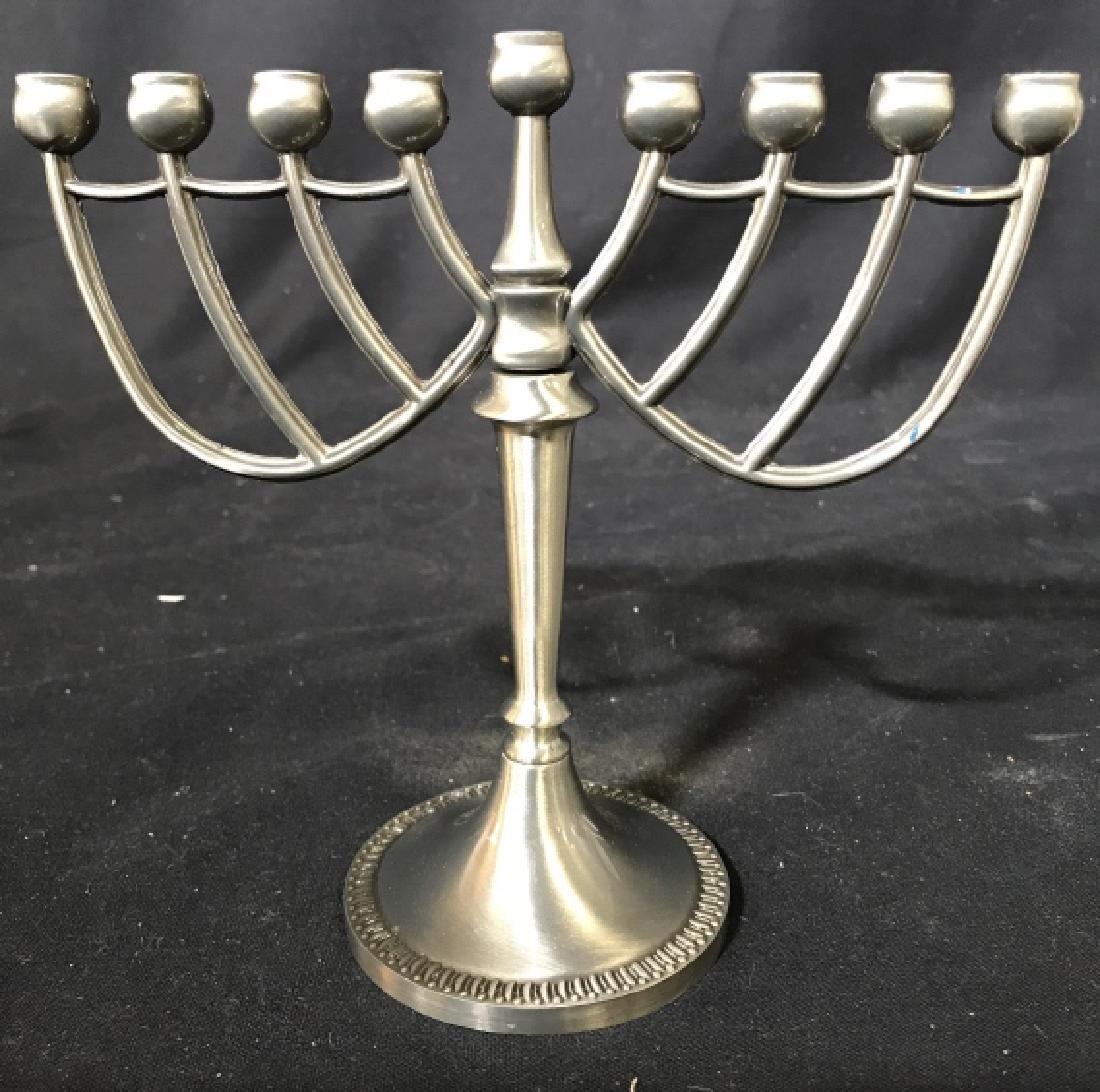 Silver Toned Metal Menorah: Piece is silver toned and metal. Measures approx 6.5 inches tall 7 inches long. Menorah, Judaica, Hebraica. ceemonial tableware and accessories 6