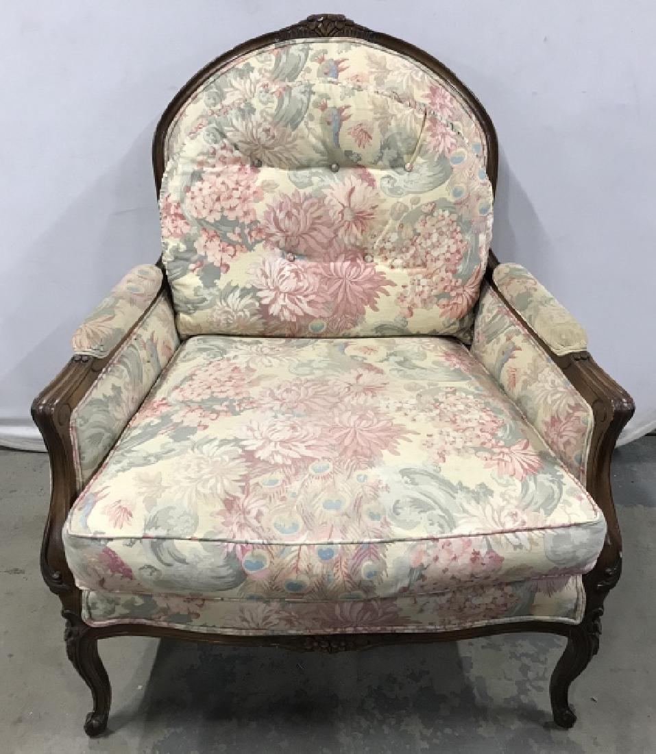 Bergere Style Armchair W Custom Upholstery: Oversized Bergere Style Lounge armchair with floral custom upholstery. Lot includes roll of extra fabric. Chair frame is carved wood with carved floral accent details. Measures approx 41.25 inches in 