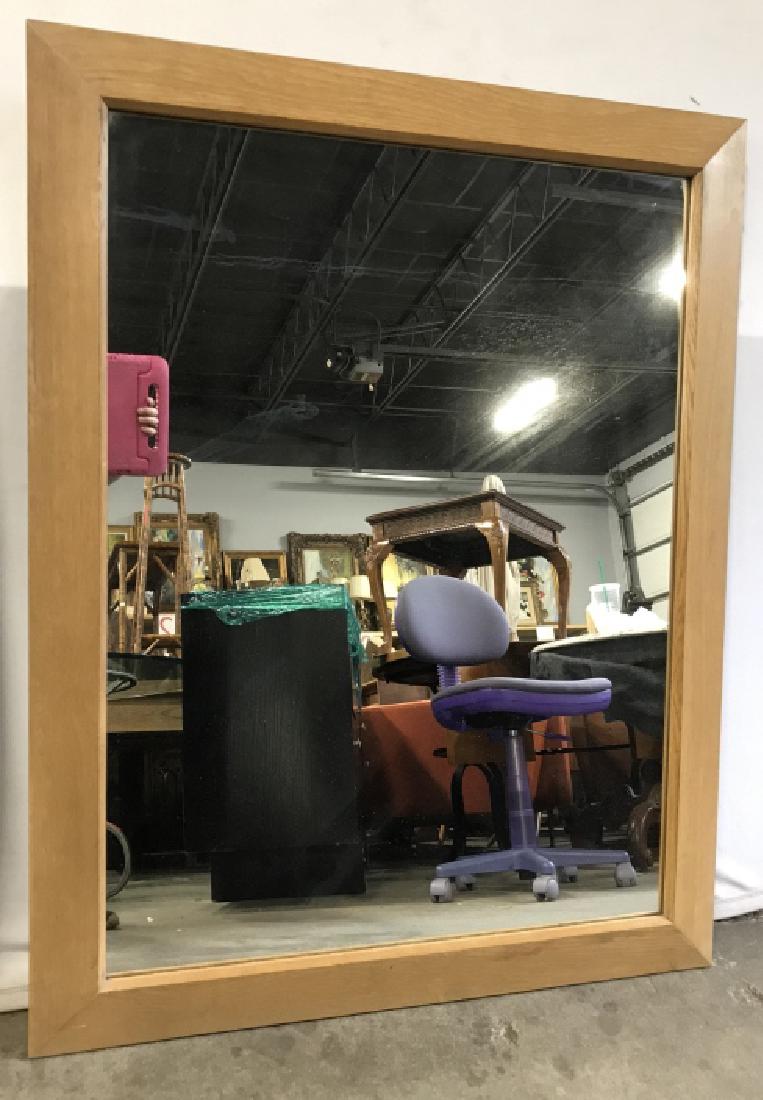 Oversized MCM Mantel Mirror in Wood Frame: Mid-Century modern mirror. Originally part of a SLIGH Cross Country Furniture Set. Medium ash brown tone wood frame. Measures approx 45.8 inches in height by 36 inches in width. Some minor white speck