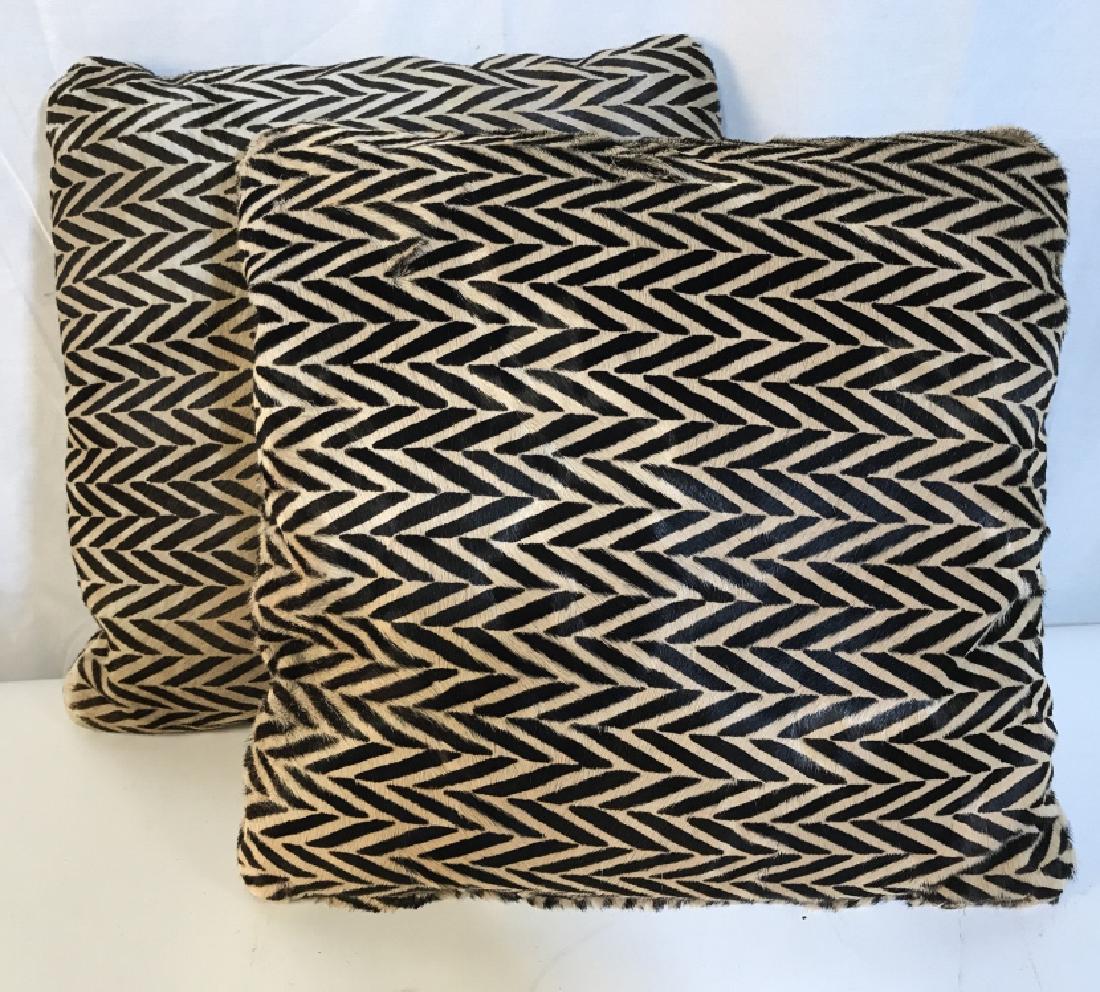 Pair Cowhide Pillows W Geometric Design: Pair Cowhide Pillows W Geometric Print Design with side zippers, some wear to corners, measures approx 15 inches square. Luxury Home Goods, Throw Pillows, Accent Pillows, Home Accessories. 2