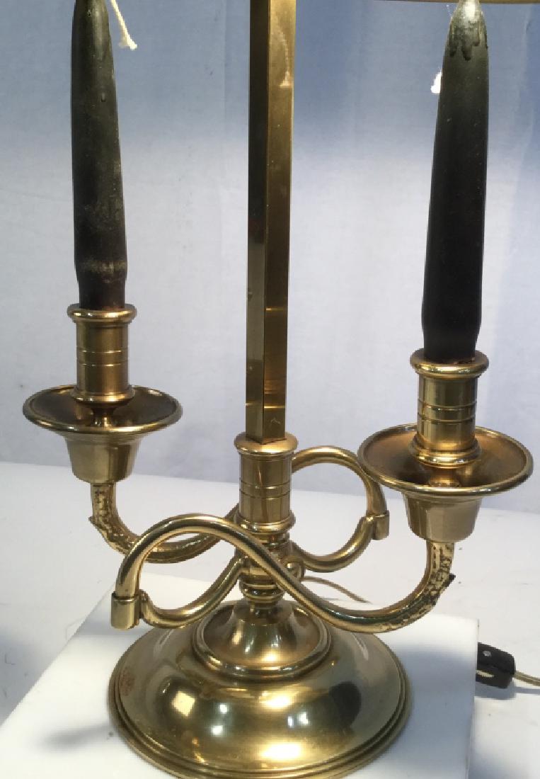 Vintage Bouillotte Double Brass Candelabra Lamp: Vintage Table Lamp. Two Light Bulbs. Two Candles. On/ off Switch on cord. Cord over 5 Ft. Brass. Oval Black Metal Shade, underside gold metal. approx 36 in. circumference. Lamp Shade adjusts placement
