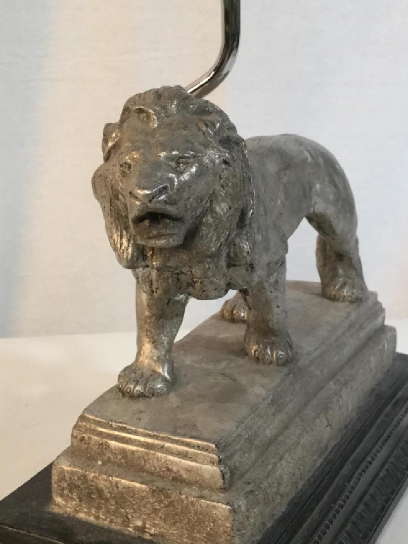 Vintage Lion Figurine Plaster Table Lamp: Silver tone lion and hardware. Major chip at corner of base. Elegant vessel finial. Small bulb harp, small bulb. Base dimensions, 12 x 5.5 in. 22.5 in. H with finial. Push on / off switch. Gold cord, 