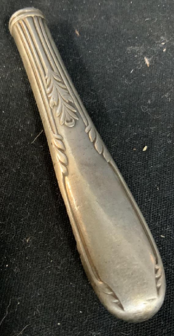 Sterling Silver Utensil Handle: Marked for Sterling, warping to side. handle of serving utensil, measures 4 inches length, sterling silver, metal salvage