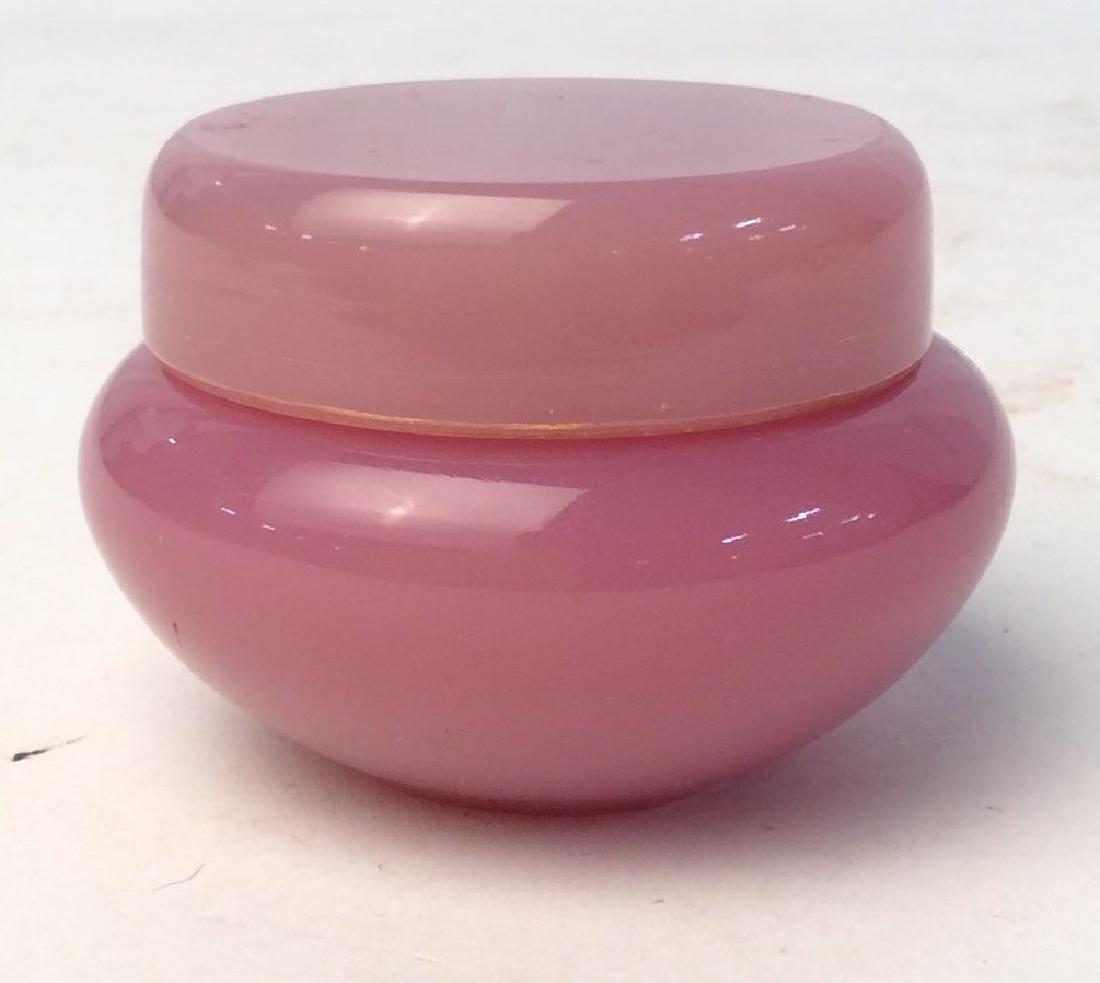 Pink Stone Miniature Keepsake Jar: appears to be natura stone Natural stone pink possibly quartz stone trinket jar/ jewelry box etc. Jar measures at approx 2 inches tall, and approx 3 inches wide. Two piece set, Jar and lid. Trinket Bo