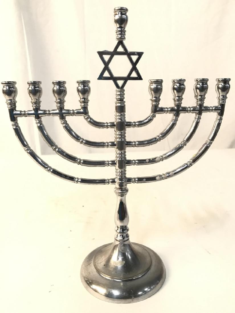 RC SILVER Toned Metal Judaica Menorah: Underside of piece is marked RC. Piece is silver toned. Appears to be pewter. Contains Star of David in center of piece. Measures approx 10.5 inches tall 8 inches wide. contains some wear from previou