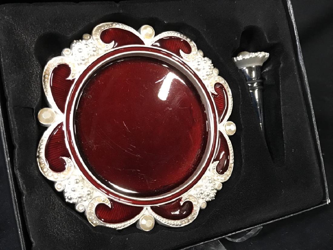 Bombay Wine Stopper & Coaster In Original Box: Red Enamel with silver toned metal and pearlescent beading. Never been used. Comes in transparent presentation box. Wine bottle diameter 3 3/8 in, stopper, 3 in length. Bar ware, Winery, Wine Coaster,