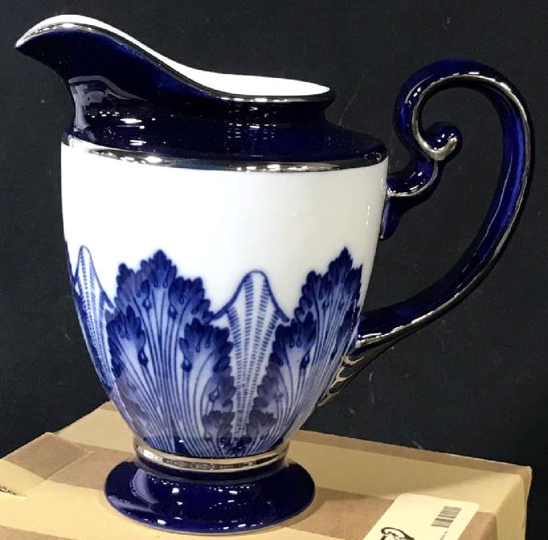 Bombay Porcelain Creamer New In Box: Never been used. In original box. 6 in. spout to handle, 5.5 in H. Silver toned trim. Porcelain Creamer, Tabletop, Tableware, Coffee, Kitchen, Dessert, Vintage Bombay Porcelain, New Porcelain, Tea Cre