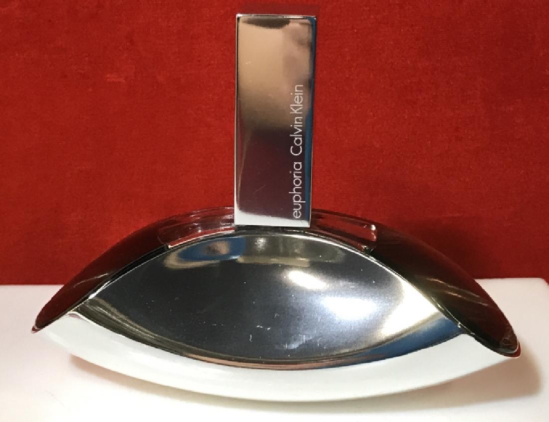 Euphoria by Calvin Klein Spray - In Original Box: Bottle of 3.4 Oz./ 100 ml. Seldom used. Eau de Parfum Spray. Box in good condition. Bottle, 5 1/4 x 4 1/4 in. Fragrance made in the USA. Beauty, Cosmetics, Fragrance, Calvin Klein, Eau de Parfum, Perf