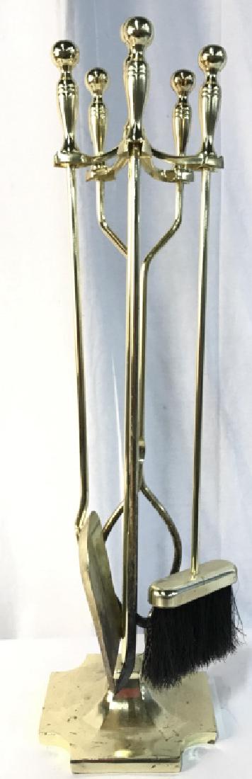 Lot 5 Gold Toned Brass Fireplace Tools: Lot includes tool stand, broom, poker, shovel and log grabber. Stand measures approx 31 inches tall 8 inches square. Fireplace tools, fireplace set, fireplace accessories, brass fireplace tools. Each 