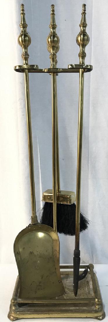 Lot 4 Gold Toned Brass Fireplace Tools: Lot includes tool stand, broom, shovel, and poker. Each piece is brass and gold toned. Stand measures approx 29 inches tall 9 inches wide, 6 inches deep. Fireplace tools, fireplace set, fireplace acce