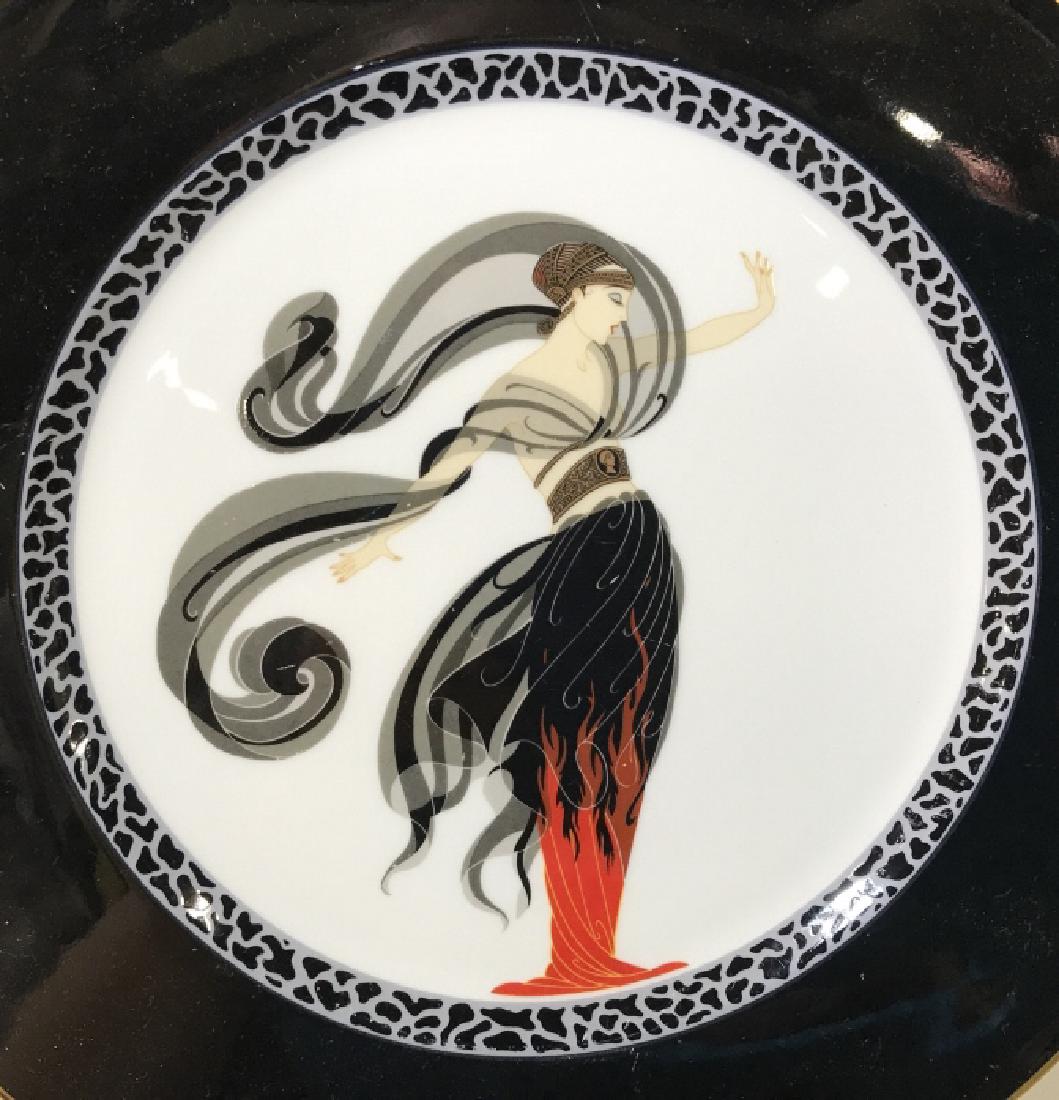 Pair ERTÉ Vintage Art Deco Decor Plates: 12 in. plates. Display or use. Bone China from Japan. Stamp Marked. Plate 1 - Flames D’ Amour no A 3053/ 1985. Plate 2 - Le Soleil Ebony no A3049/1985. Limited Edition Pieces. Both good condition. E