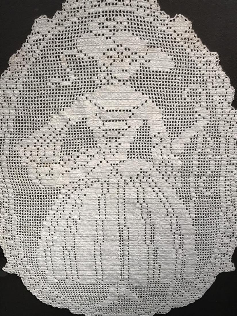 Framed Vintage Figural Woven Doily: Doily depicts woman. Doily is mounted and set behind glass in gold and cream tone wood frame. Measures approx 26.25 inches in height by 20.25 inches in width with frame. Vintage doily, decorative arts