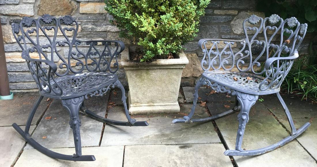 Pair Iron Outdoor Rocking Chairs W Openwork Design: Pair Of Painted Iron Outdoor Rocking Chairs W Openwork floral and scroll Design, measures approx 29 inches tall x 23 inches wide x 27 inches deep, shows minor signs of rusting and paint chips. Outdoor