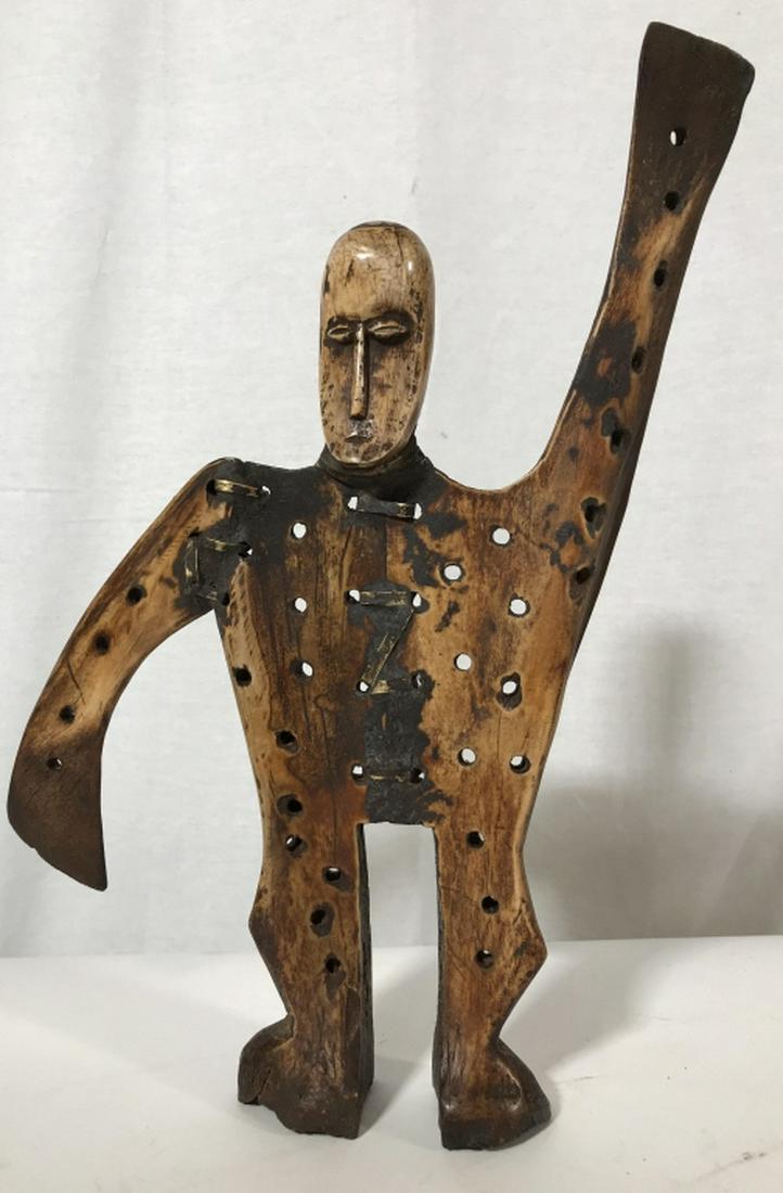 African Lega Tribe Carved & Pierced Bone Figural: Carved and pierced bone figural from the Lega Tribe, Democratic Republic of the Congo, Central Africa, c. 1920s. Figure has exaggerated, outstretched arms and is pierced with holes throughout its body