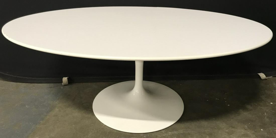 MCM Saarinen for Knoll Tulip Coffee Table: Mid-Century Modern Edition Saarinen for Knoll 50th Anniversary Tulip coffee table. White in tone, oval top surface shape. Underside is marked for Knoll. Measures approx 15.5 inches in height by 42 inc