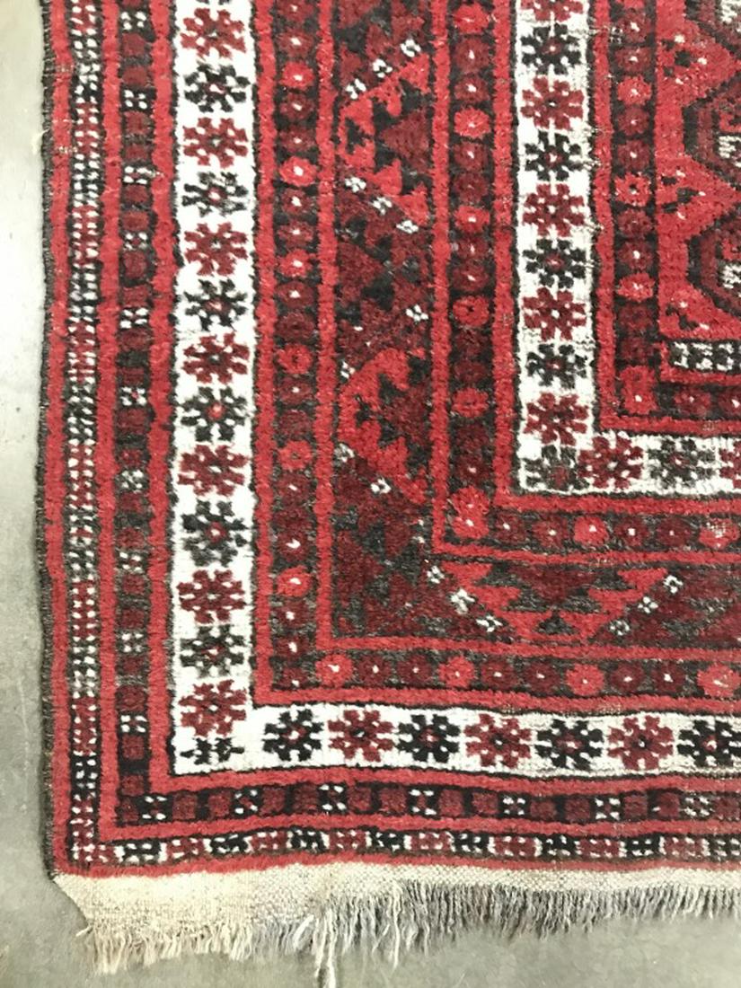 Vintage Handmade Multi Toned Wool Rug: Rug is handmade and vintage. Contains toned of red, cream, black, & brown. Contains geometric detail. Piece measures approx 71 inches long 55 inches wide. Home accessory and decor, decorative arts, in