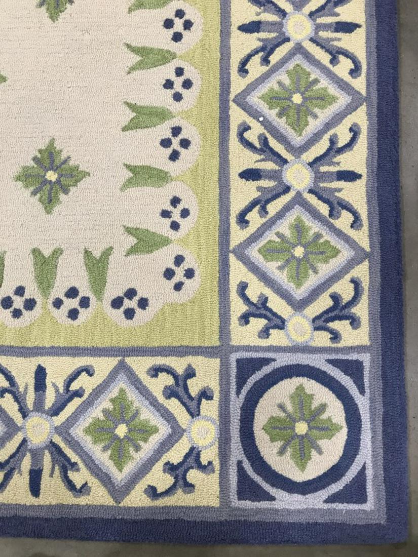 TERRAZO COLLECTION Hand Hooked Rug: Label on back of piece reads TERRAZO COLLECTION HAND HOOKED. Piece contains tones of blue, green, cream, and light blue. Measures approx 88 inches wide 102 inches long. Home accessory and decor, decor