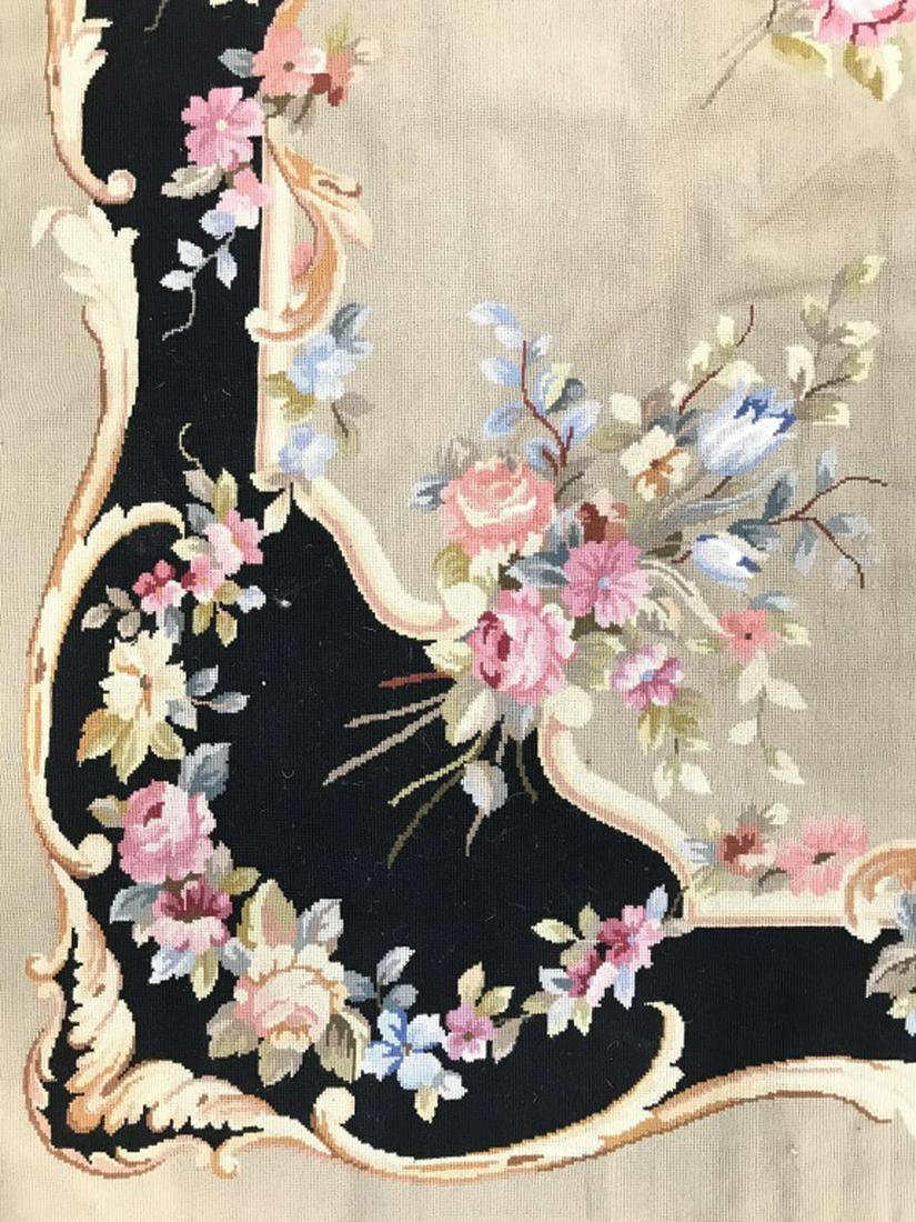 Multi Toned Floral Detailed Needlepoint Rug: Rug contains multi toned floral and leaf detail with tones of pink, black, green, slate, beige, and tan. Rug appears to possibly be Aubusson. Measures approx 118 inches long 94 inches wide. Appears to