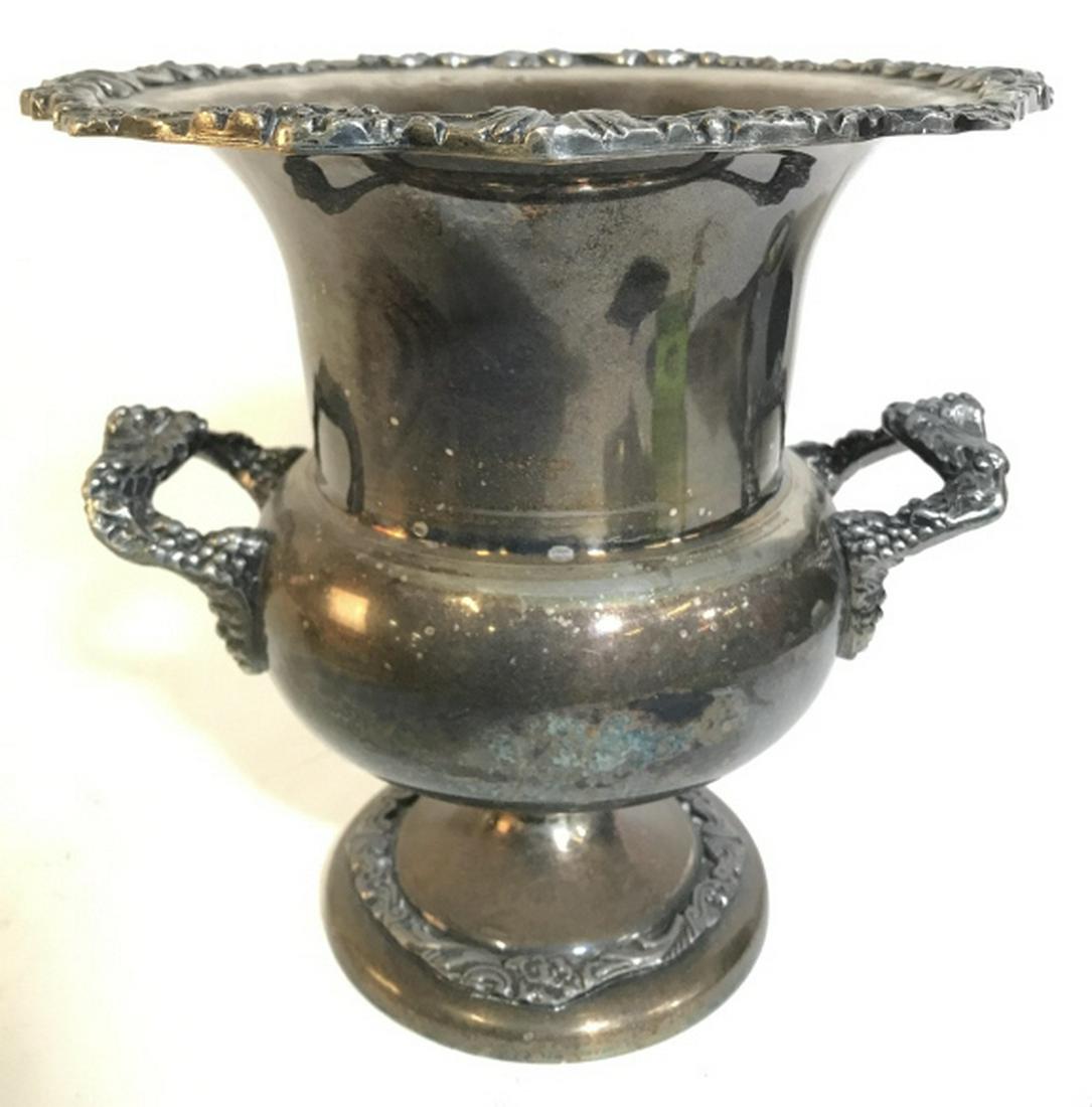 SHERIDAN Silver On Copper Handled Ice Bucket: Underside of piece is marked SHERIDAN SILVER ON COPPER. Piece is monogrammed, reads, “ABC COSTUME BALL, 1969. Contains 2 handles. Piece is Pedestaled. Handles and edges contain intricate & ornate de