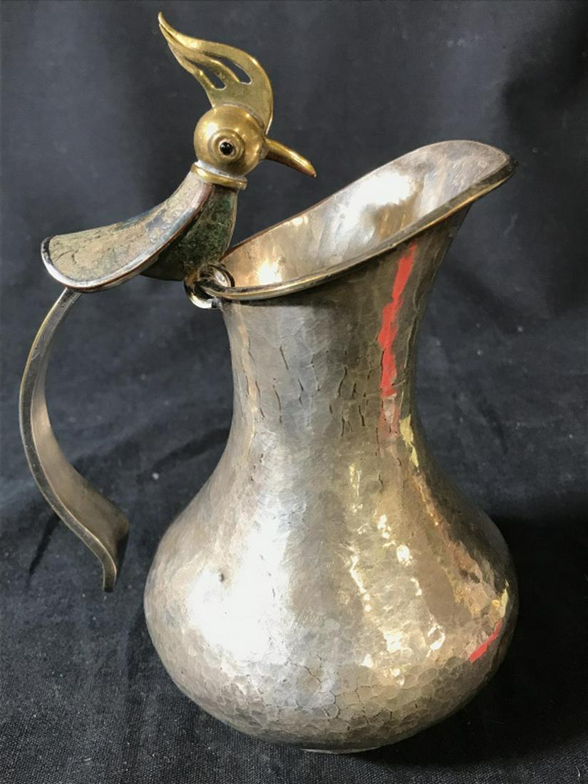 LOS CASTILLO Silver Plated Bird Pitcher: Underside is marked LOS CASTILLO PLATEADO. Top of piece has bird Figural with gold toned head. Some natural stone mosaic details, some stones missing Measures approx 6.5 inches tall 5 inches wide with