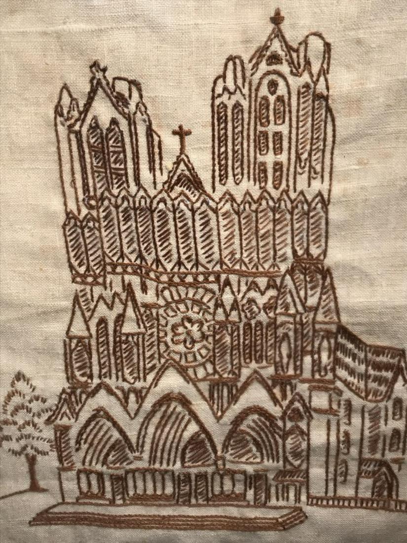 Vintage Sampler W Cathedral Motif: Sampler features embroidered cathedral building, along with text ‘The Cathedral.’ Sampler is set behind glass in wood frame. Frame measures approx 14.75 inches in height by 11.75 inches in width.