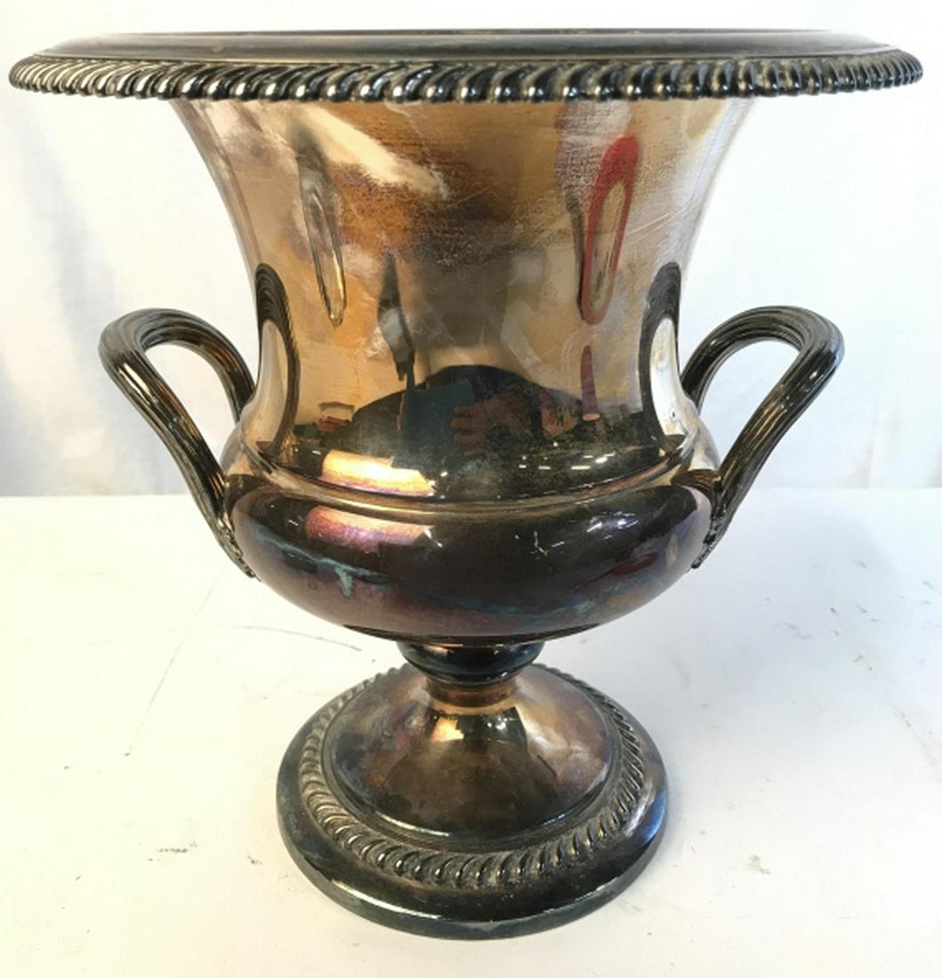 INTERNATIONAL SILVER CO Wine Cooler: Underside reads INTERNATIONAL SILVER CO 650. Piece has 2 handles. Piece is Pedestaled. Appears to be monogrammed on underside. Wine cooler, Ice Bucket. Measures approx 10 inches tall and wide. Decorat