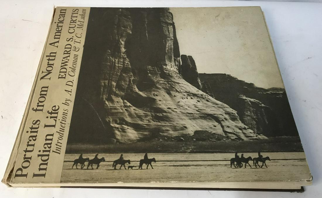 EDWARD CURTIS PHOTO BOOK: Title- Portraits from North American Indian Life, Promontory Press, NYC, 1972. Size, 18 x 14.5 x 1 in. Binding is loose. No pages ripped. Edward Curtis was a photographer of the American West & the Am