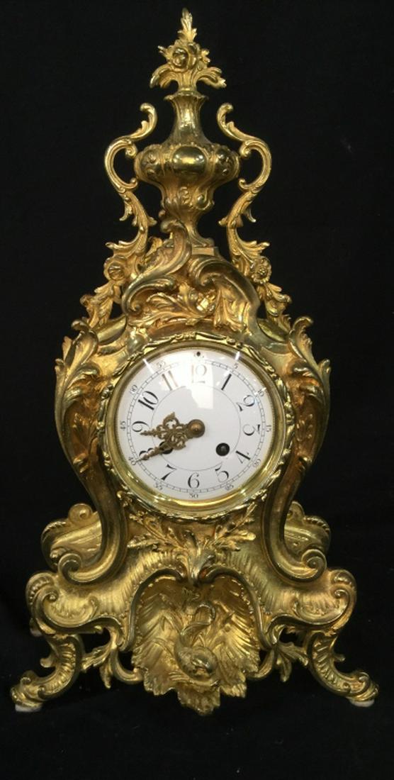 Gilded Metal Art Nouveau Mantle Clock: In the style of 18th Century Gold French Mantle Clock, Art Nouveau with s scrolls, scrolls, sinuous curves dolphin Relief, Crown with icanthus leaves scrolled top, measures app 19 inches ht, width app