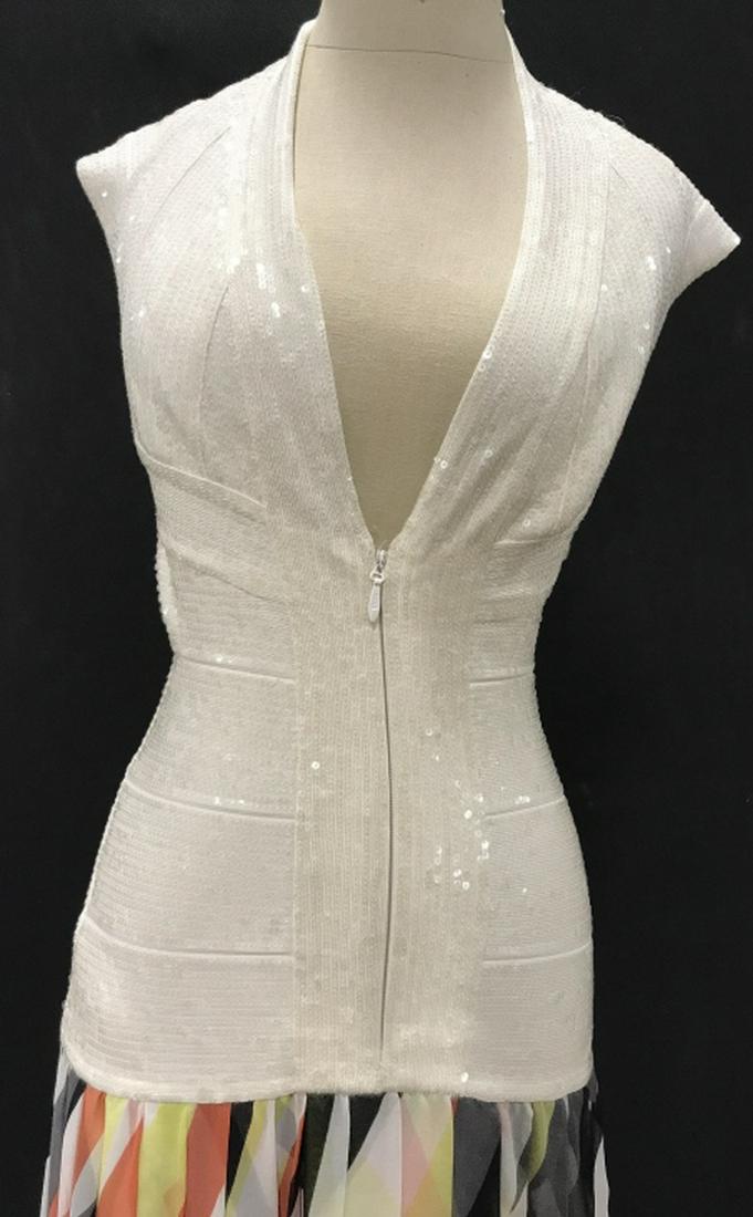 HERVE LEGER COUTURE Evening Dress: Vintage Herve Leger. Dress Size small. Front closure with zipper and clasp hooks. Clasps are there, hooks needs to be added. Low hip skirt, almost mermaid style. Upper part of dress stretches. Low cut