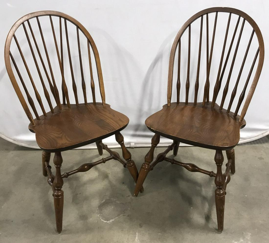 Lot 4 NICHOLS & STONE Windsor Dining Chairs: Marked on undersides for NICHOLS & STONE. Carved wood Windsor dining chairs. Each measures approx 35.75 inches in height by 17.5 inches in width by 20 inches in depth. Chairs have some surface wear li