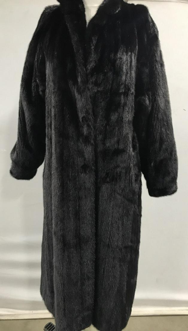 Authentic MINK Fur COAT: Full Length Coat with very good interior stitching. Possibly size M. Low collar. Monogrammed on interior lining ‘ Maiomi Braunreit’ . Interior pocket, wrap belt. Three closure hooks, missing top L