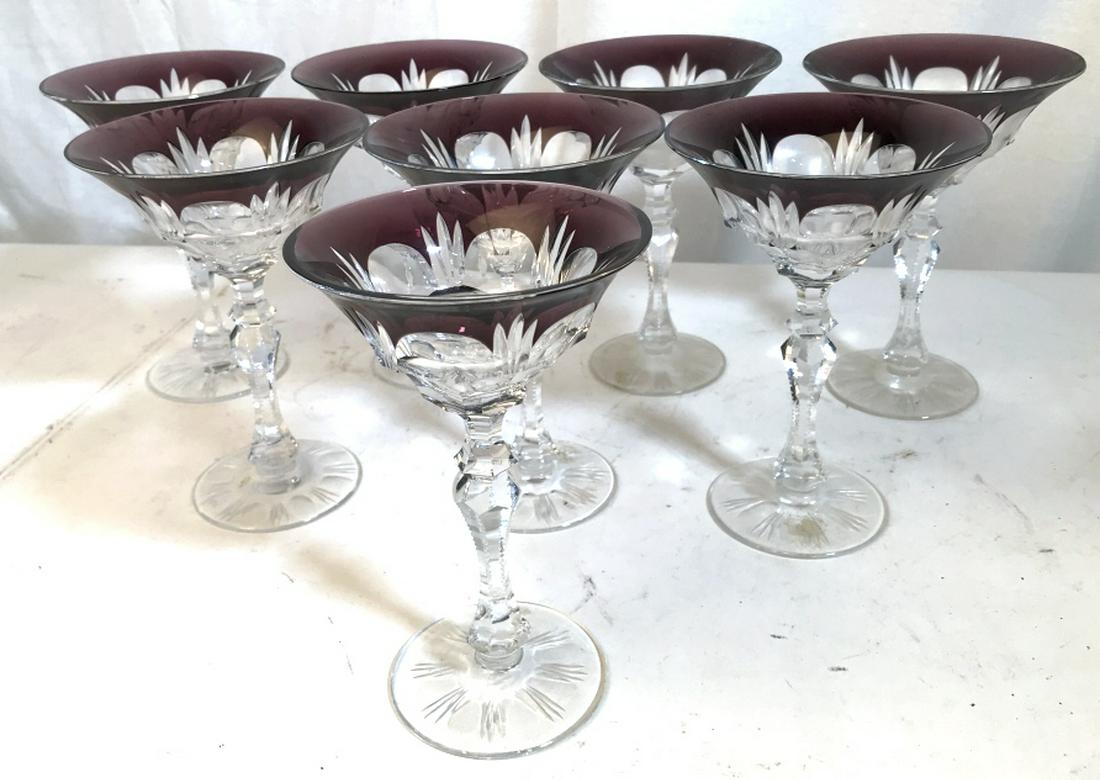 Set 8 Bohemian Amethyst Cut Crystal Stemware: Floral shape design created by wide amethyst glass rim. Average cup diameter is 5 3/8. Possibly Handmade, as glass sizes differ slightly. Height, 7.5 in. No scratches, nicks or chips. Crystal Stemware