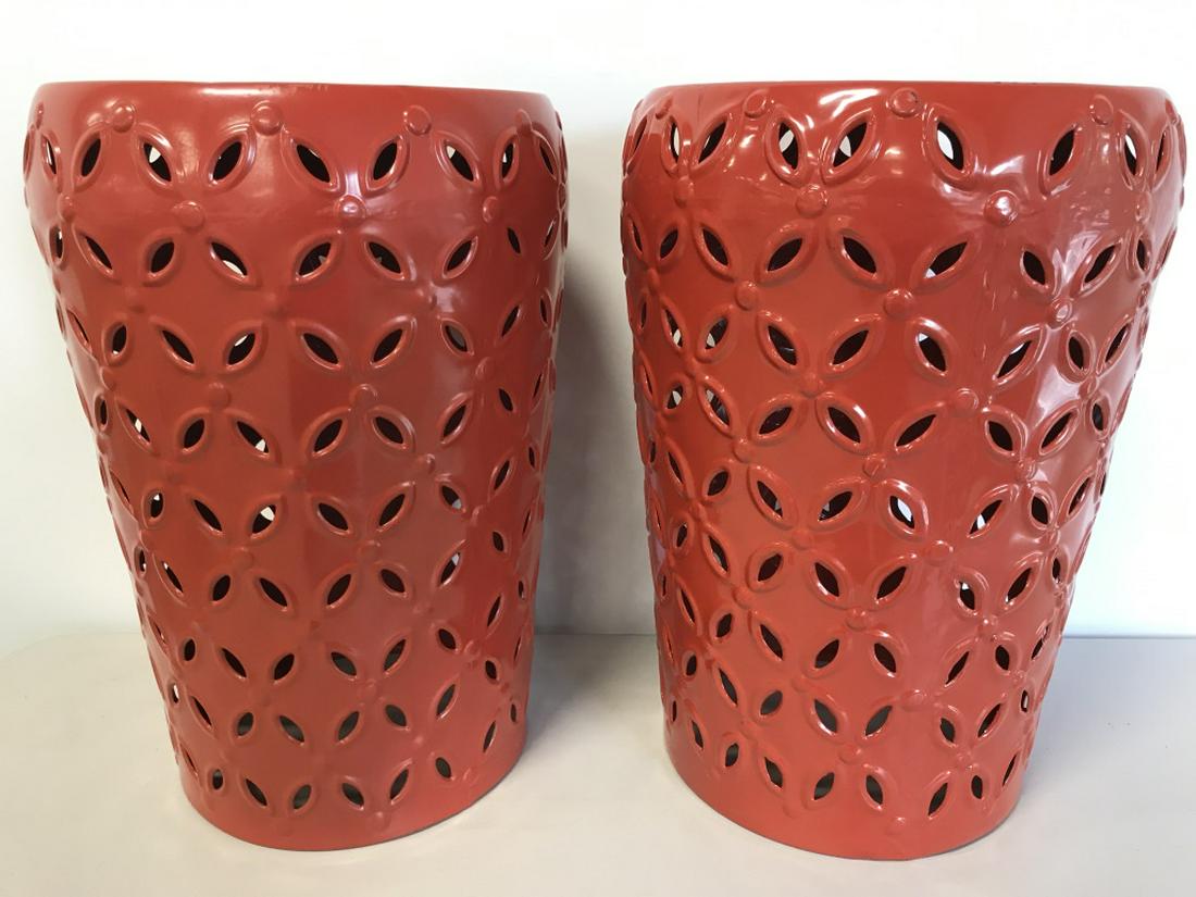 Pair Red Toned Metal Garden Stools: Garden Stools Are Red Toned. Each has pierced detail. Top of piece is round. Garden Stools, Metal Stools, red stools, pierced stools. Each measures approx. 18 inches tall 13 inches wide. garden stools