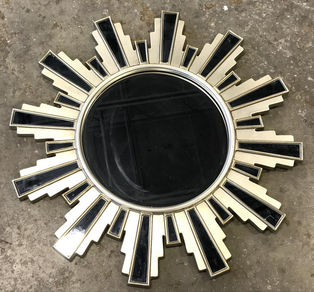 Mirror in Art Deco Style Sunburst Frame: Mirrored paneling on sunburst frame. Frame appears to be material Composite. Measures approx 34 inches in diameter. Sunburst frame, Art Deco Style Frame, interior home decor accessory. 7