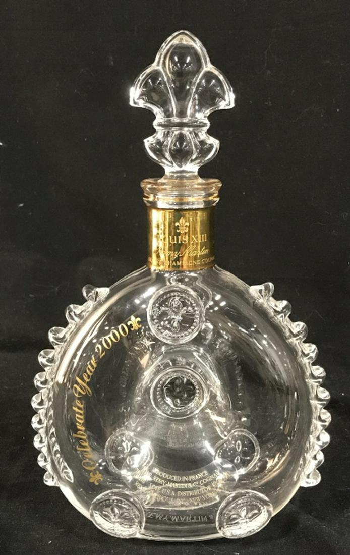 BACCARAT LouIs XIII Rèmy Martin Cognac Decanter: E. Remy Martin Baccarat Crystal Empty Bottle, 750ml, superb condition with stopper. Bottle no. 8771. 11 in. tall with stopper. 7 in. wide. Approx 3.4 in. thick. No box. Baccarat, Baccarat Cognac Bottl