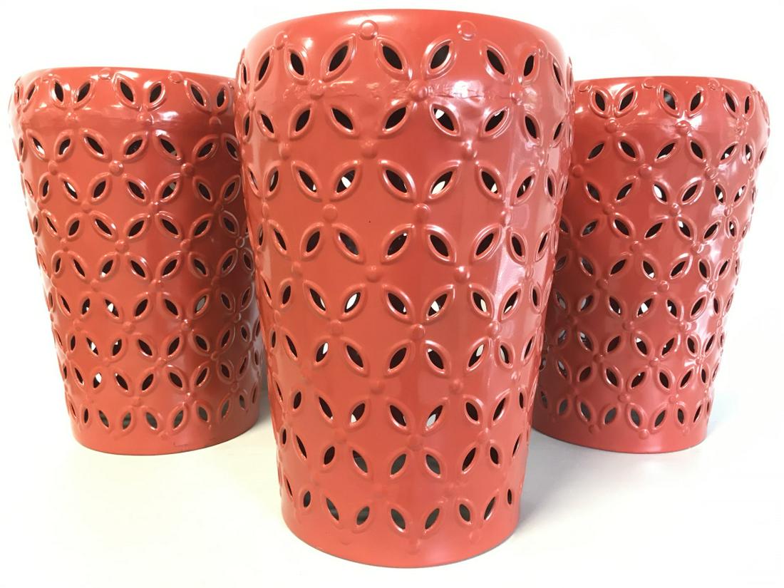 Lot 3 Red Toned Metal Garden Stools: Garden Stools Are Red Toned. Each has pierced detail. Top of piece is round. Garden Stools, Metal Stools, red stools, pierced stools. Each measures approx 18 inches tall 13 inches wide. garden stools,
