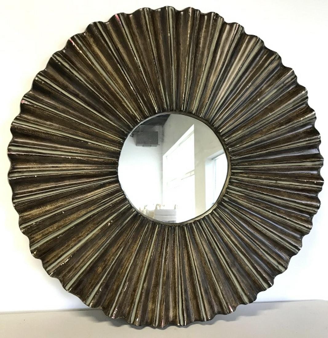 Round Mirror in Wood Style Sunburst Frame: Material Composite Sunburst Frame is painted to appear like wood. Measures approx 36 inches in diameter. Some surface wear like scuffs and scratches to frame. Interior home decor accessory, statement 