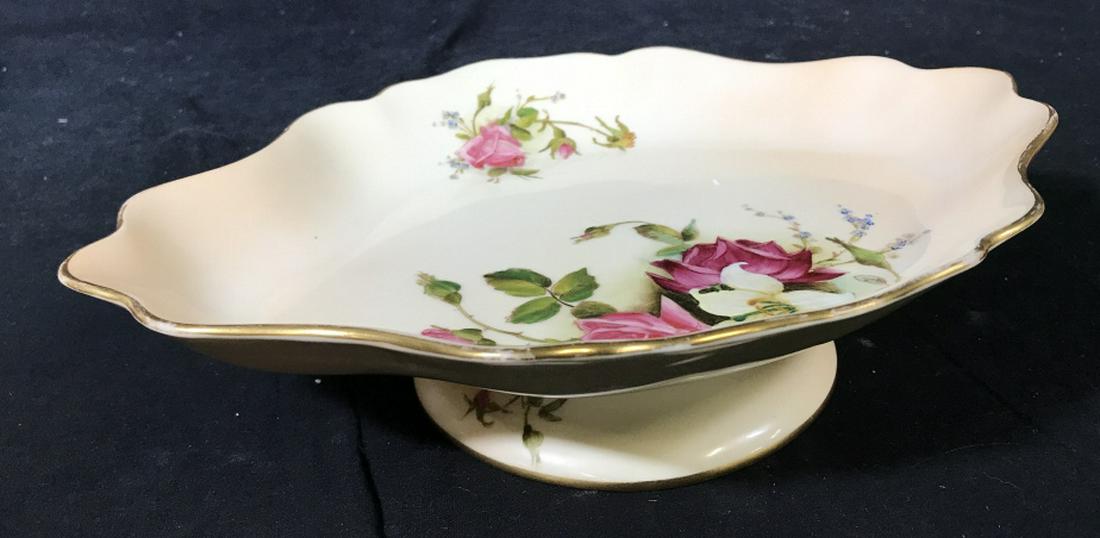 Royal Worcester England Pedestal Dish porcelain: Footed dessert stand, footed bowl, marked underside, Hand Painted floral gold rimmed, tableware, collectible, trademarked with flag, measures ht 3 inches top app 11.5 by 9 inches