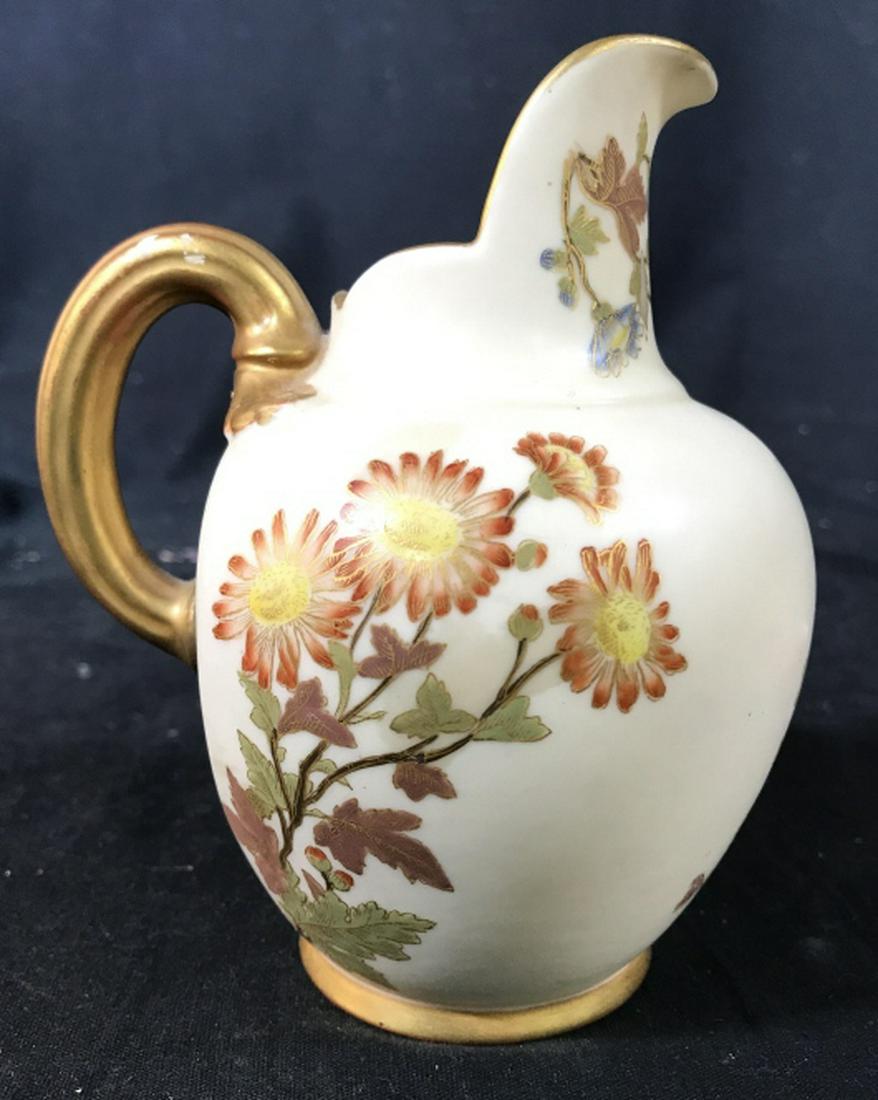 Rand N Painted Porcelain Pitcher: Jug, vessel vase, Signed trademarked underside collectible vintage possibly antique porcelain, Measures ht app 6 inches handle to spout app 5.5 inches, collectible tableware