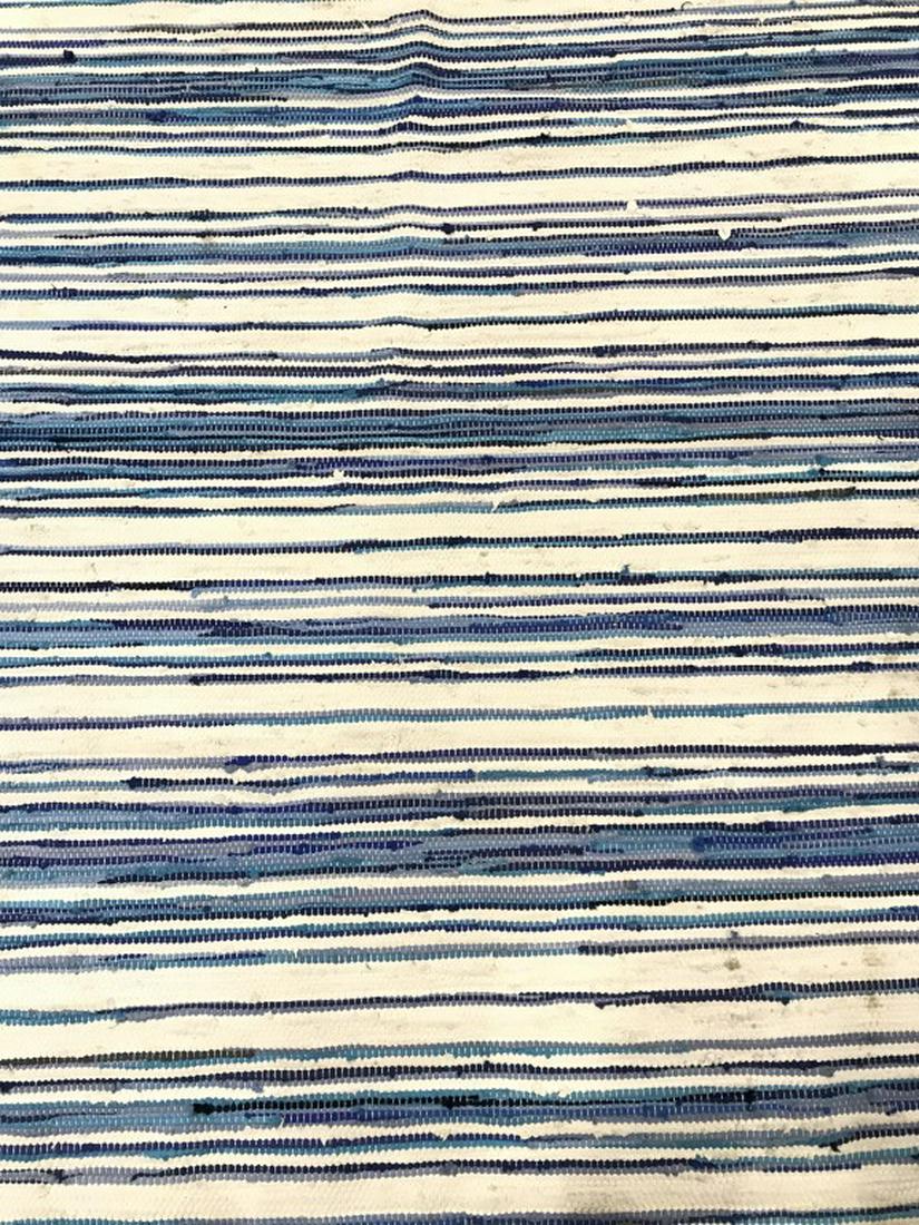 Striped Fringed Area Rug: Rug contains stripes with tones of black, blue, aqua, & white. Piece contains fringes. Measures approx 75 inches long 45 inches wide. Needs cleaning. Possibly Handmade. home accent and decor interior 